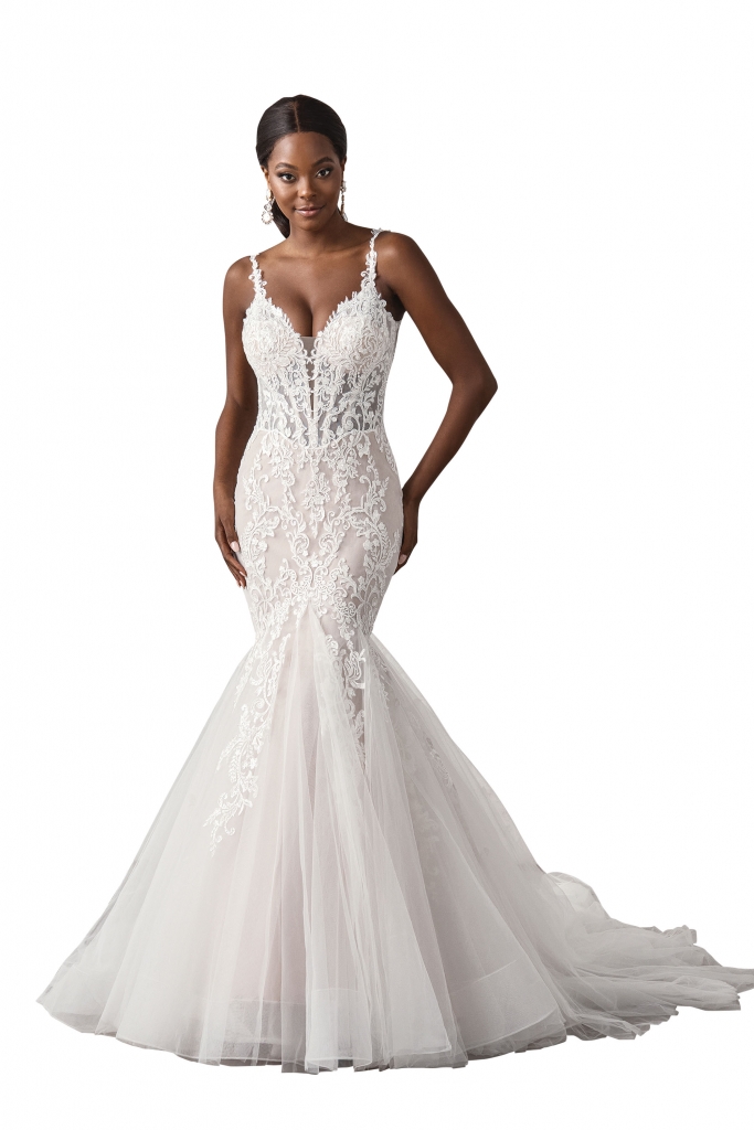 Sincerity Bridal Trumpet bridal gown with sheer bodice and Basque waist. Two Oaks Bridal Boutique, call for price