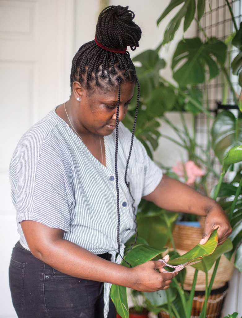 Belle Gathers, owner of Plant Oasis, creates the soil and hand-pots every organic plant in her Belle Originals collection.