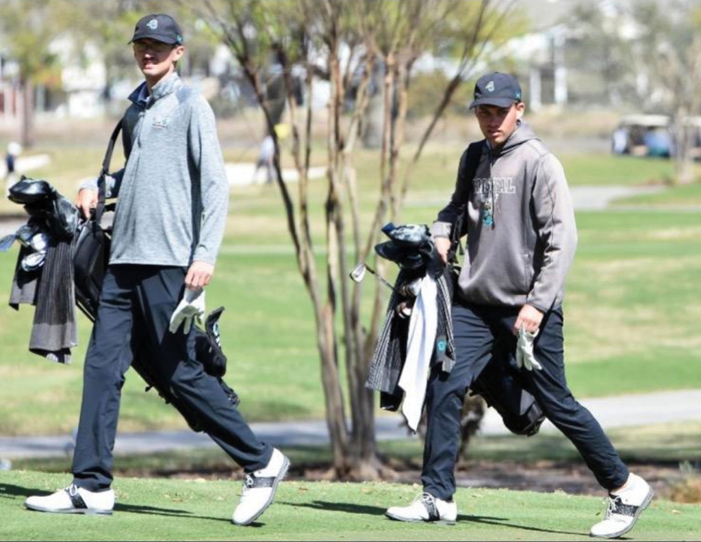 Seth Taylor and Garrett Cooper have  purposeful strides with their game faces on as they survey the course.