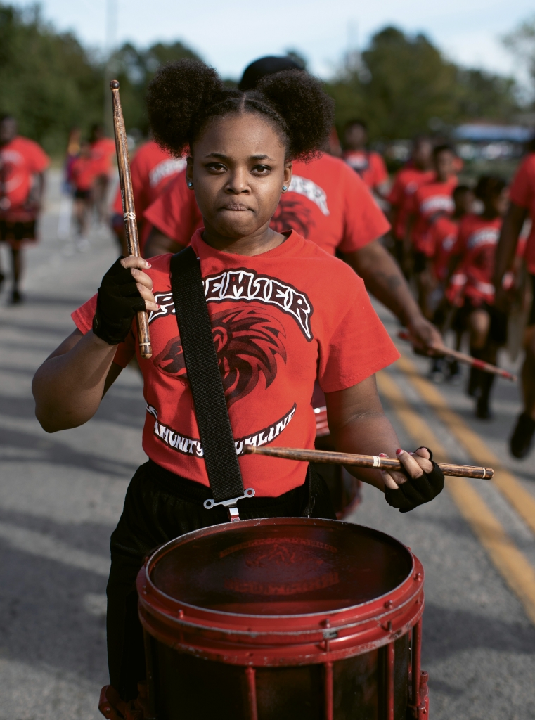 During a performance at the Andrews Homecoming Parade, snare drummer Faith Gurley leads the drummers in downtown Andrews.