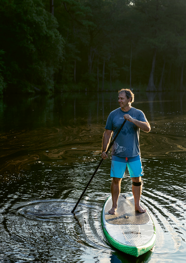 Todd Sutz eyes the tannin-stained blackwater of the Waccamaw River.