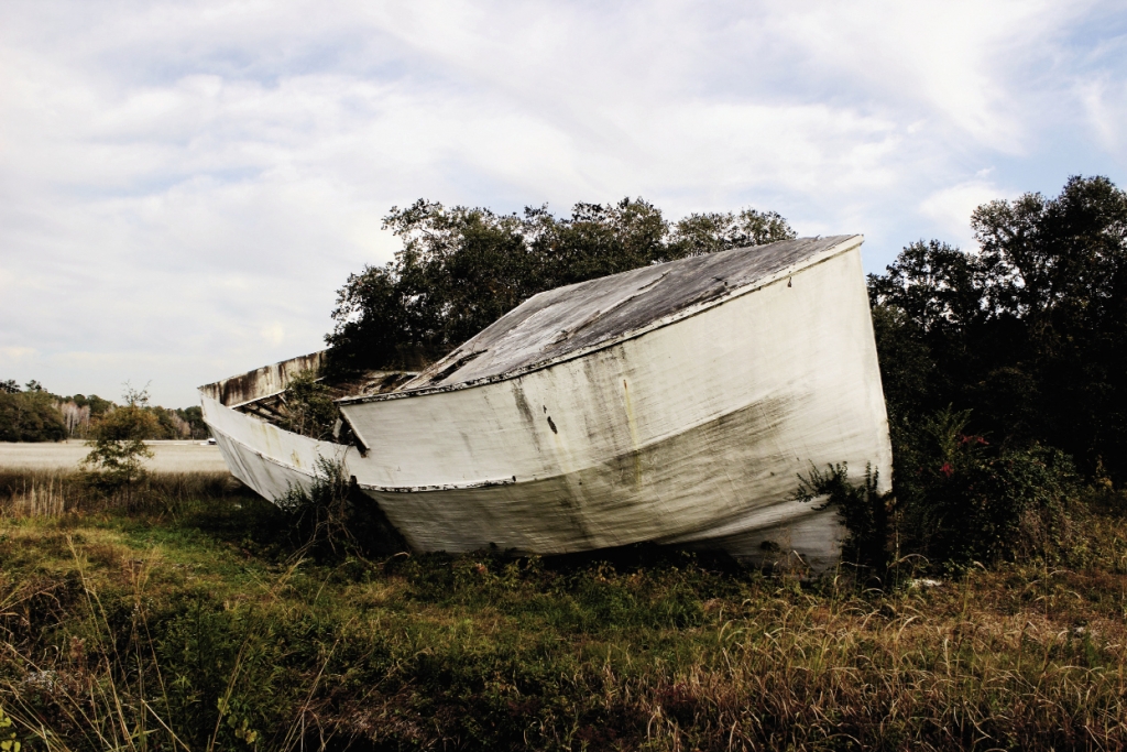 Washed Ashore: The shell of a shrimp trawler that was left high and dry in McClellanville by Hurricane Hugo in 1989