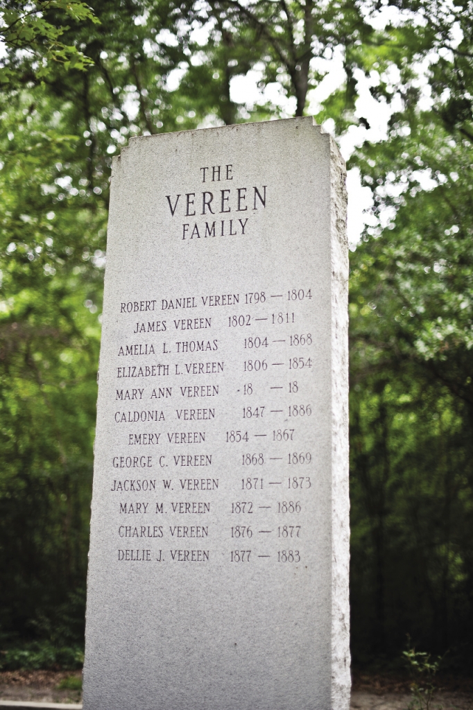 A white marble statue details the Vereen family tree during the 1700s-1800s.