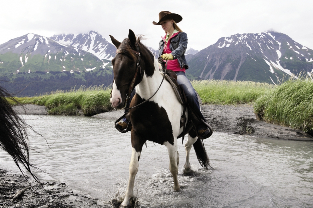 Through The Last Frontier: Newman rides a horse named Orca outside of Seward, Alaska.