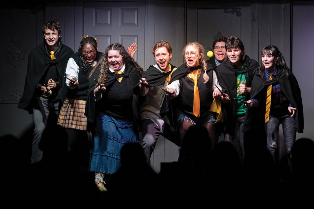 Cast members perform in &quot;Puffs, or Seven Increasingly Eventful Ears at a Certain School of Magic and Magic&quot;