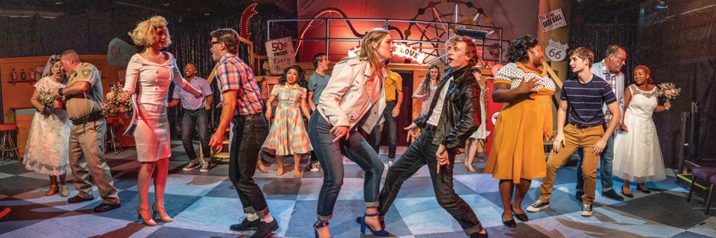 Long Bay Theatre cast members rock out in a production of &quot;All Shook Up&quot; | credit: Greg London