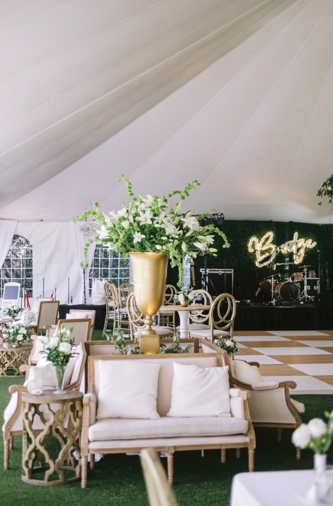 Garden Glory:  Ireland’s vision for the reception was a timeless showpiece of white flower blooms everywhere.