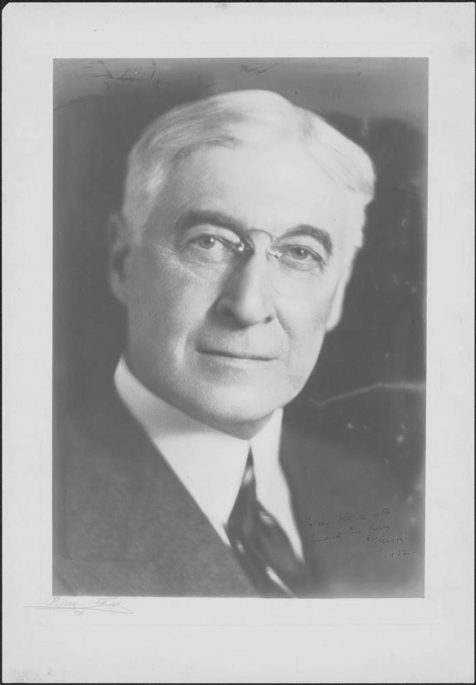 Portrait shot of Baruch with pince-nez glasses, a popular style at the time. The photo inscription reads “To my Belle, with fondest love from ‘Chick,’ 1932.”
