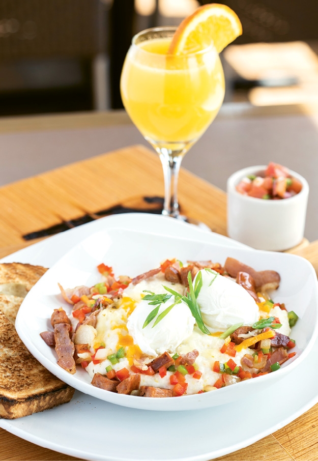 Try this on for a stick-to-your-ribs breakfast! The Garden City Grit Bowl layers country ham, andouille sausage, peppers, onions, eggs, pepper jack cheese and salsa over a bowl of creamy grits.