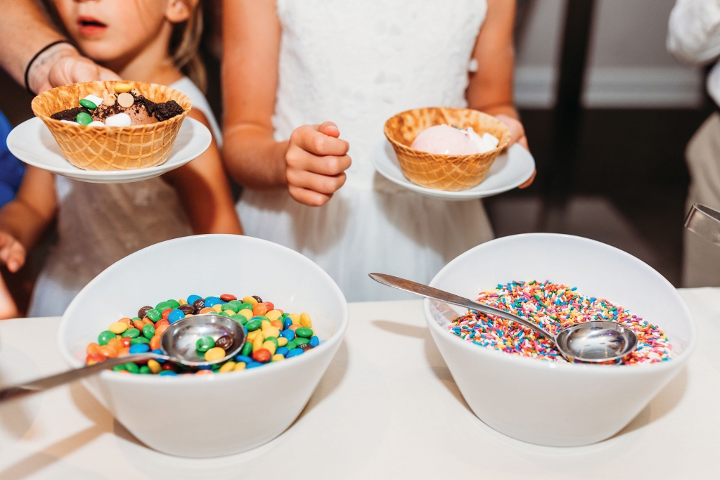 A Few of My Favorite Things: The bride and groom chose their fave foods and their fave dessert by way of a make-your-own ice cream sundae bar surrounded by their fave close friends and family.