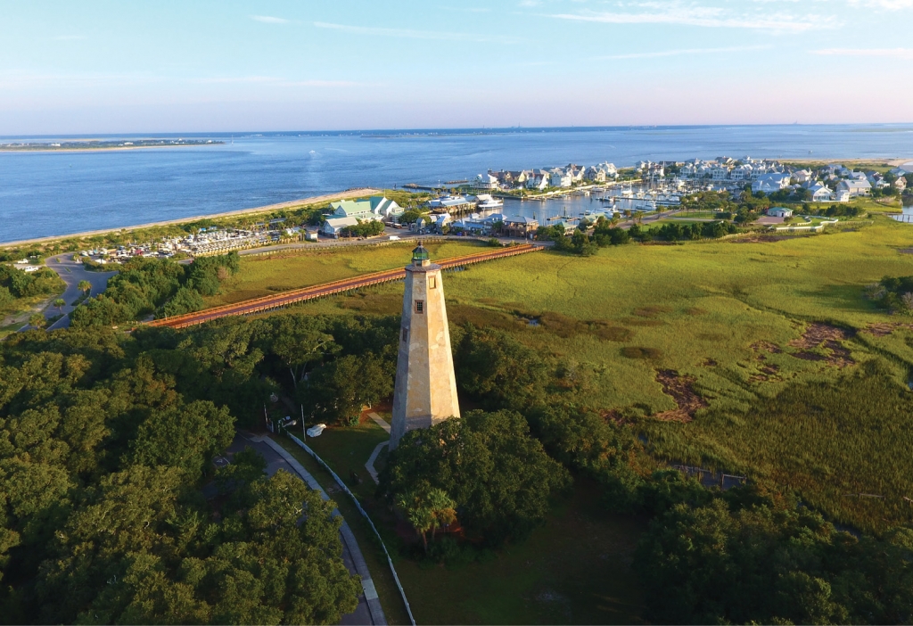 Old Baldy stands watch over Bald Head Island and was once the only sailor’s beacon to the mouth of the Cape Fear River, leading to Wilmington, N.C. Wooded golf cart and bike paths provide a relaxing way to travel the nearly 13,000-acre property.