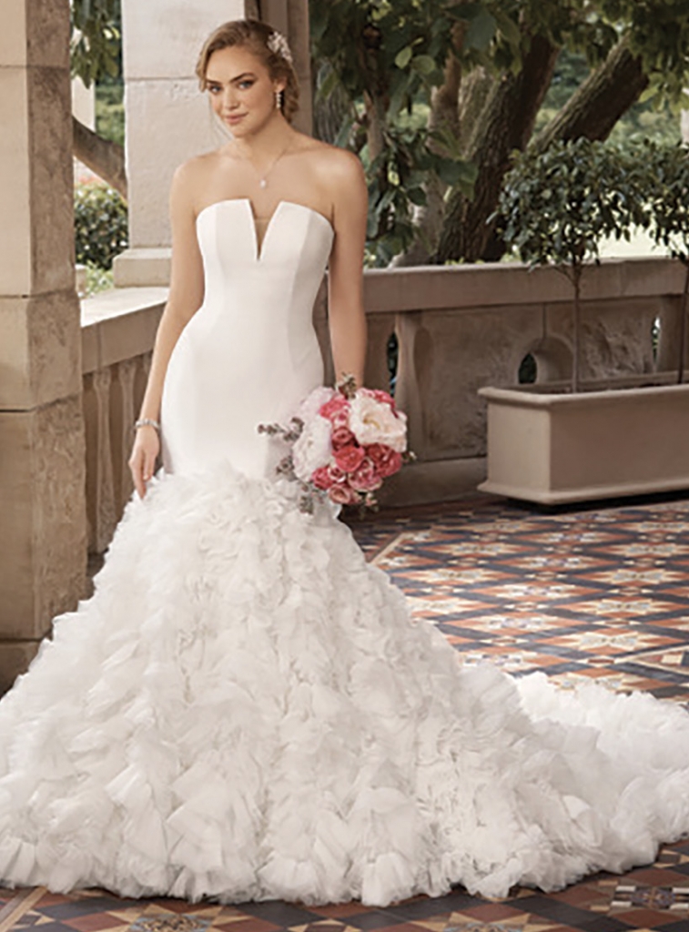 Loren by Sophia Tolli Dare to be different! Loren, Style Y22187, becomes an off-shoulder mermaid wedding dress in an instant, with matching detachable sleeves adorned with royal organza ruffles. The Foxy Lady, $2,159